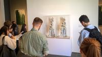 Narrative medicine students studying sculpture.